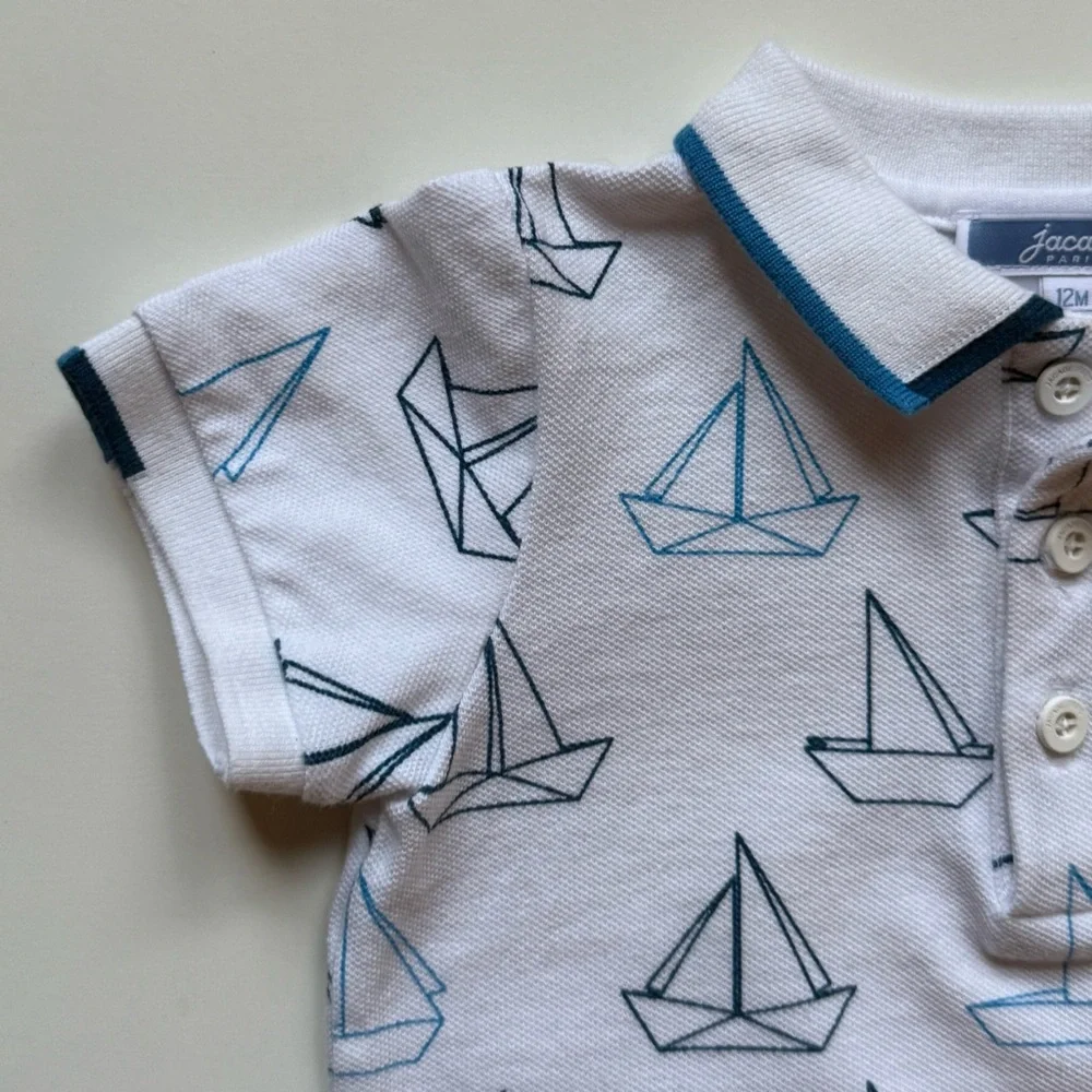 Jacadi Boys White Pique Knit Polo Shirt with Blue Sailboat Print - Size 12M